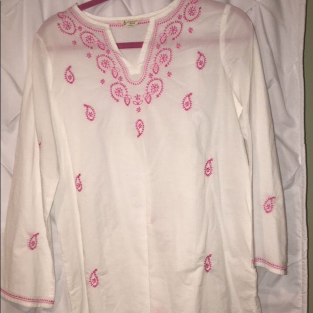 white tunic with pink embroidery